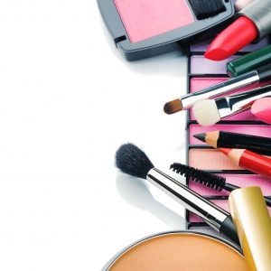 Colorful make-up products isolated over white